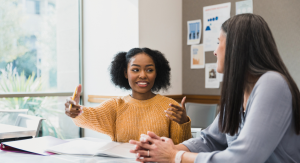 student-meets-with-teacher-to-discuss-plan