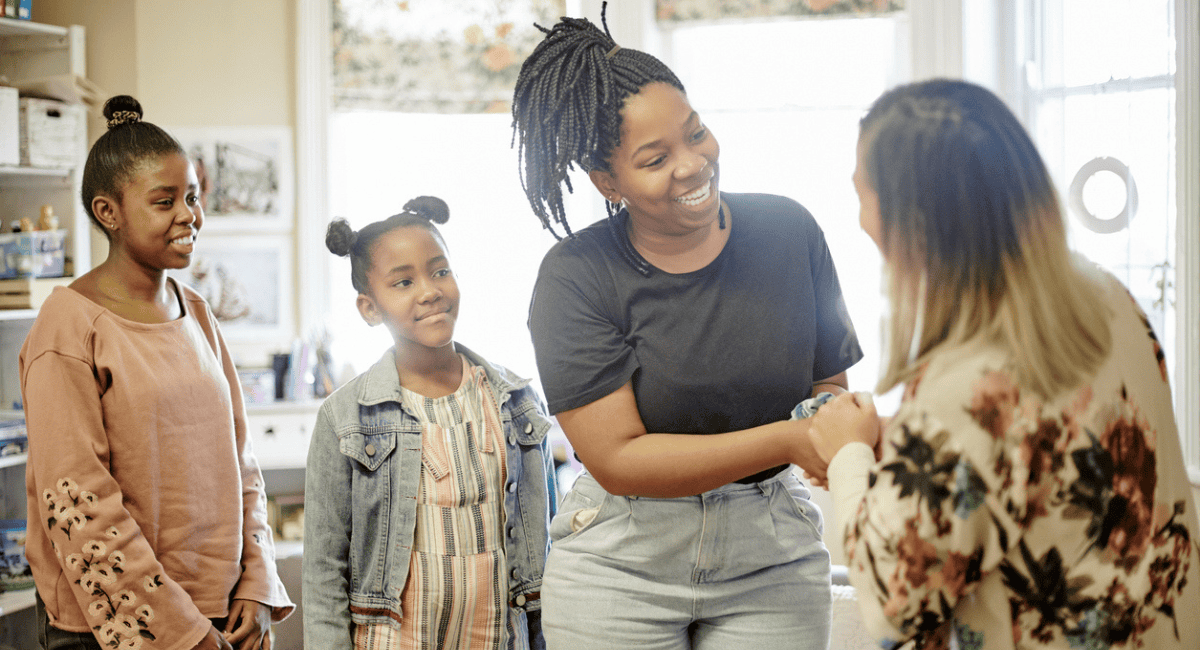 mom-greeted-teacher-at-parent-engagement-event